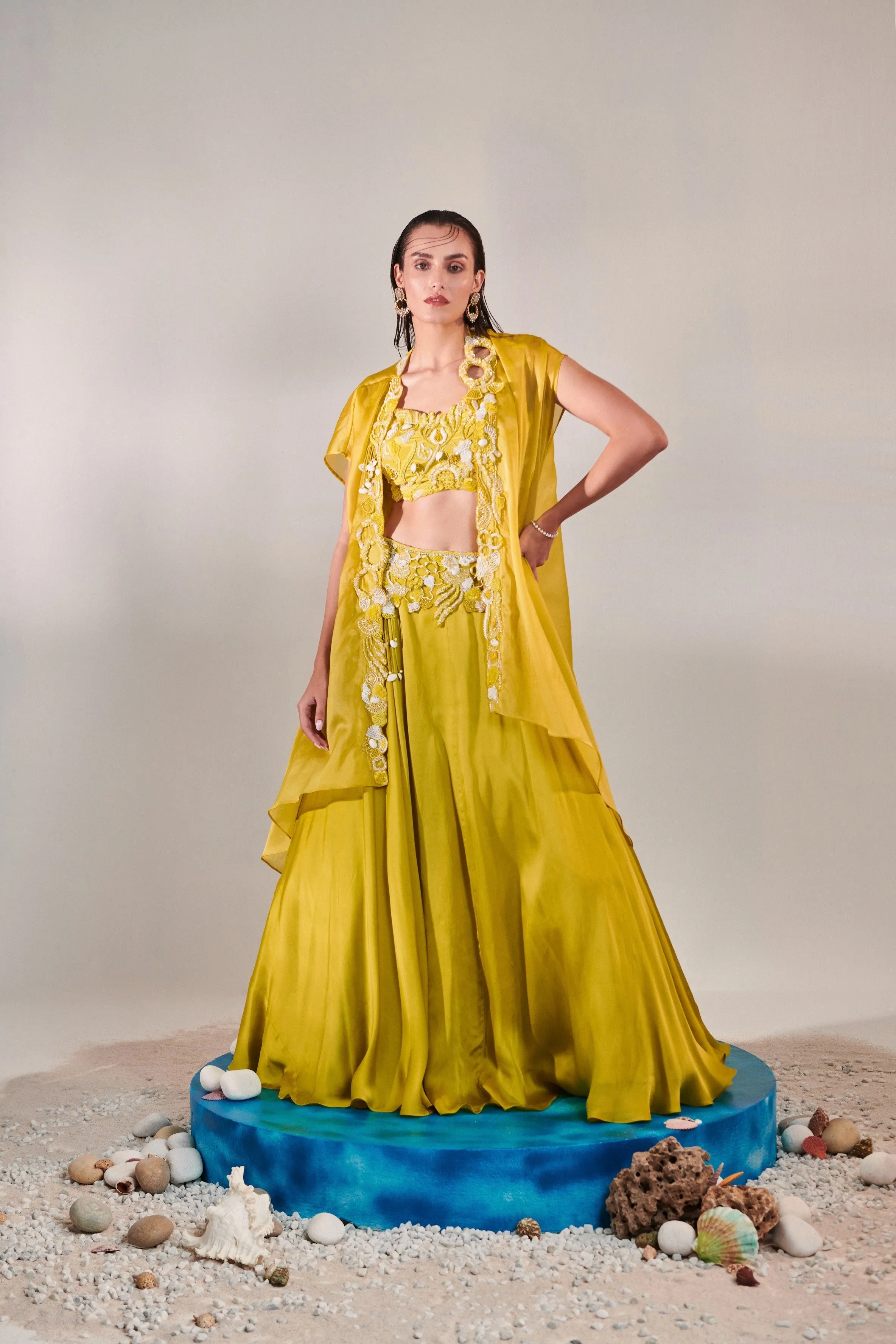 Cutwork blouse; cape; lehenga set